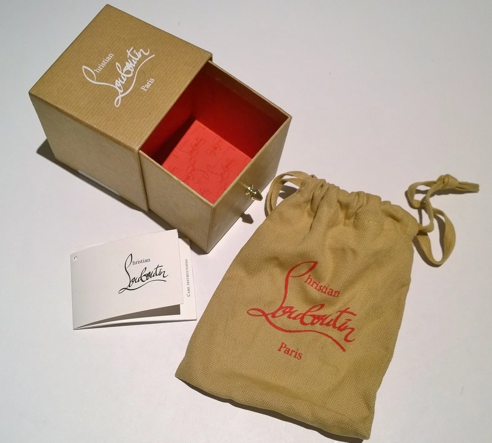 Christian Louboutin M Rubber Lug Sole Metal Keyring Charm in Black and Red