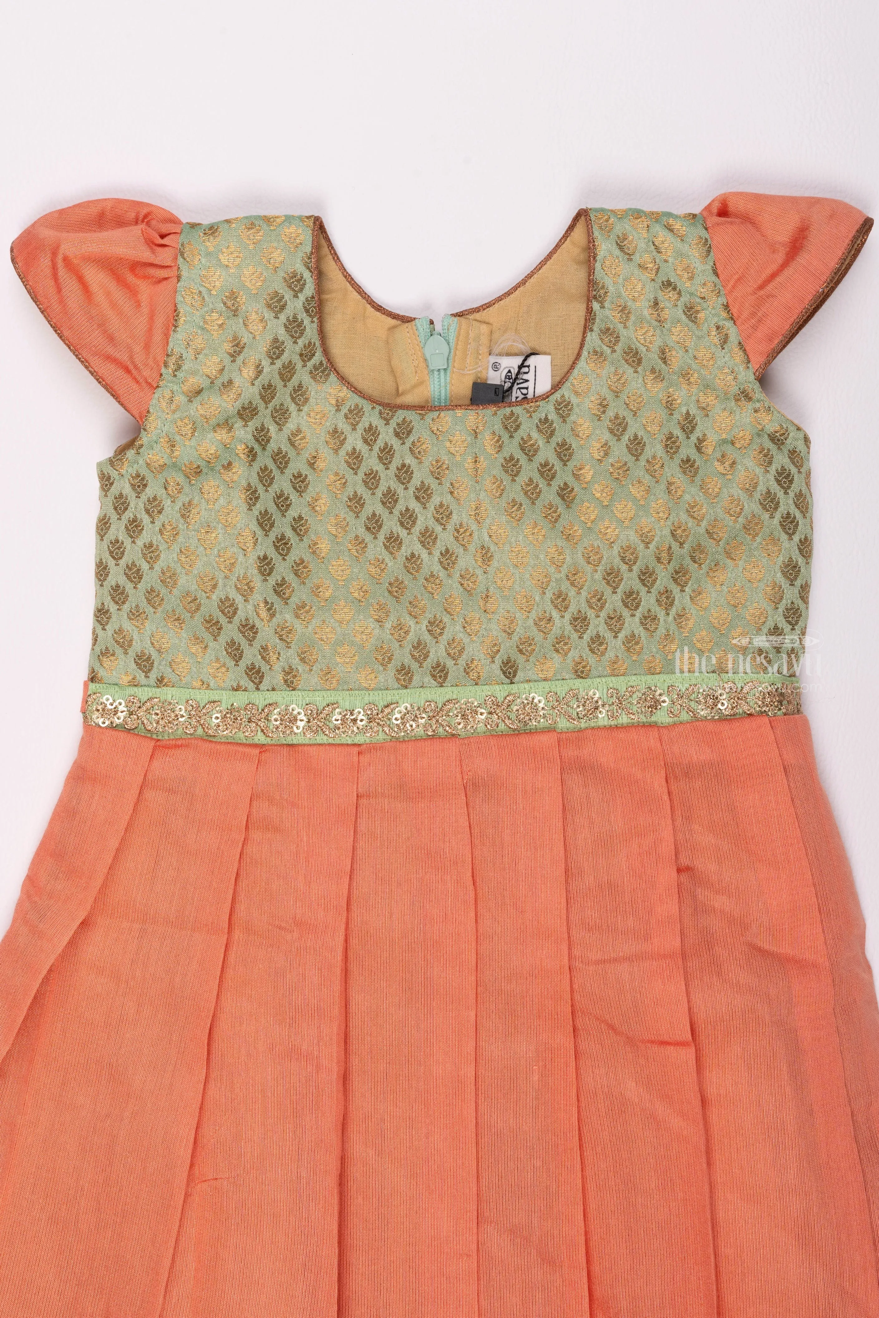 Elegant Salmon and Gold Traditional Pattu Silk Frock for Girls with Delicate Golden Patterns