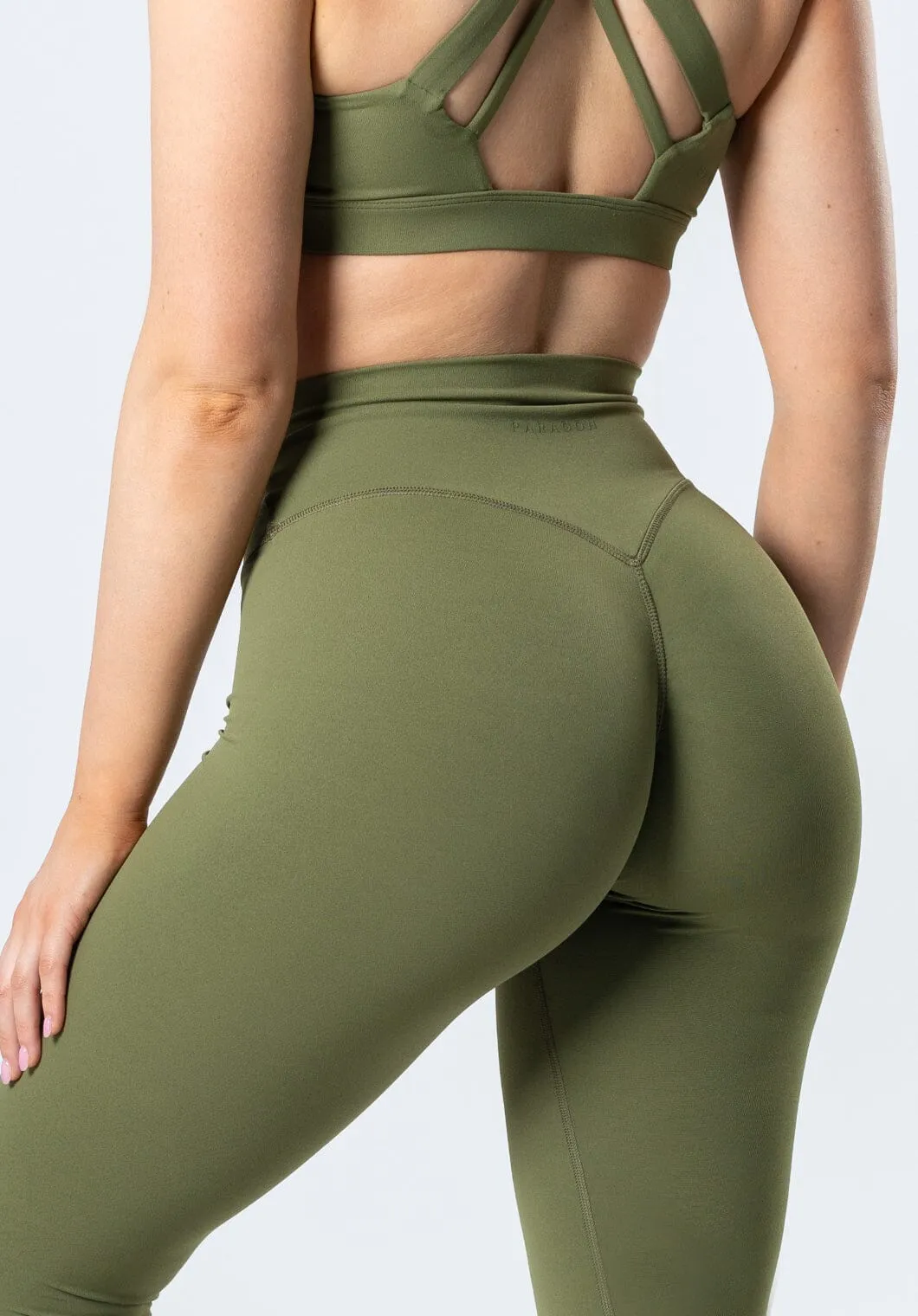 Here is an optimized title for the product:

Premium Olive Sculptseam™ Plus Legging for Enhanced Comfort and Performance
