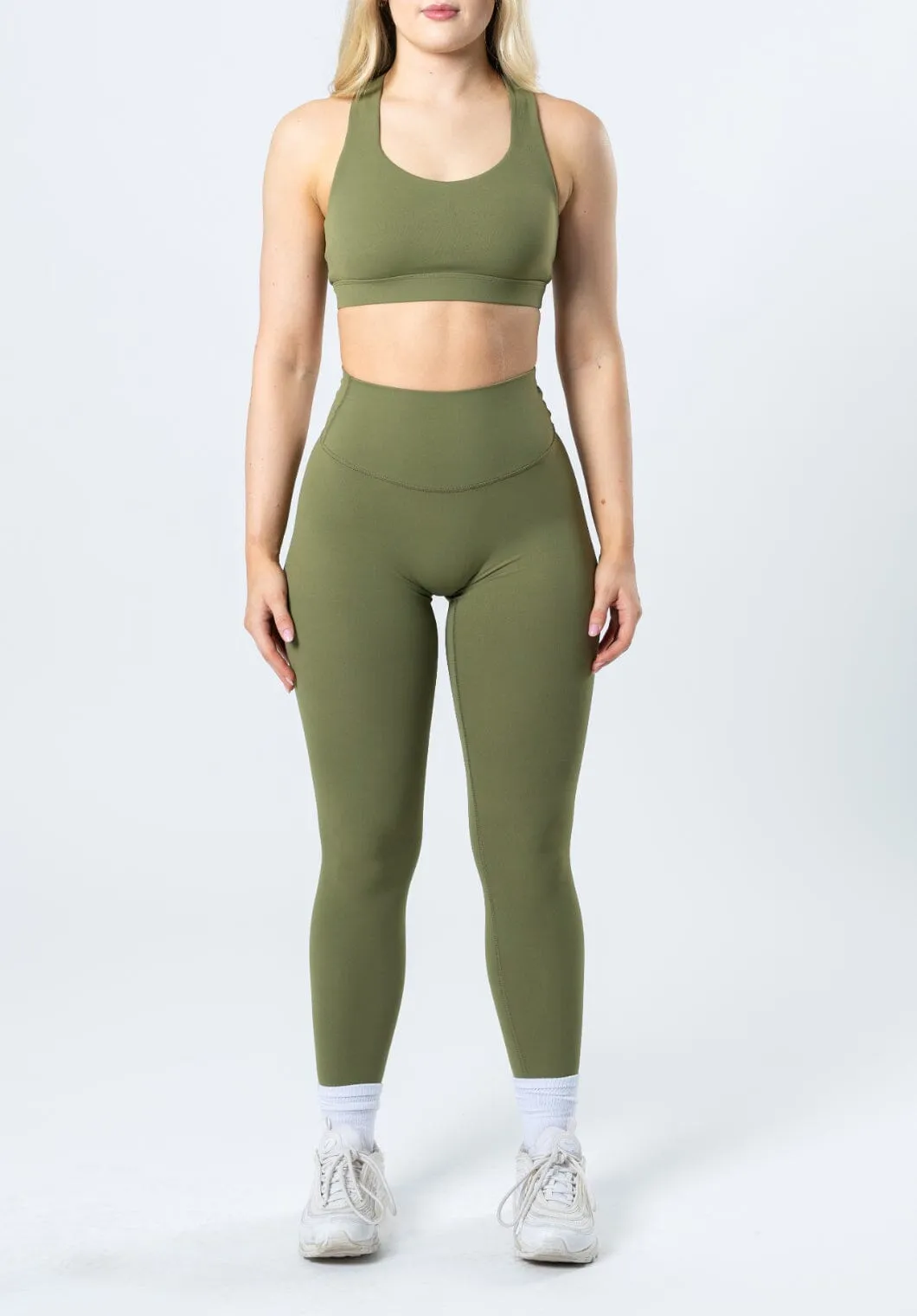 Here is an optimized title for the product:

Premium Olive Sculptseam™ Plus Legging for Enhanced Comfort and Performance